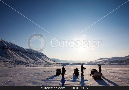 To use this stock image in your creative project, please select the size you need over to the right and click the "Add to Cart" button.
Your downloaded image will come with the Cutcaster watermark removed so don’t worry about the watermark you see on this page. Winter Adventure Landscape stock photo, Three people on a winter snowmobile adventure in Svalbard, Norway by Tyler Olson