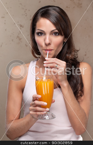 To use this stock image in your creative project, please select the size you need over to the right and click the "Add to Cart" button.
Your downloaded image will come with the Cutcaster watermark removed so don’t worry about the watermark you see on this page. Woman drinking orange juice stock photo, Portrait of pretty young woman drinking orange juice by Tyler Olson