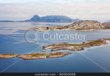 To use this stock image in your creative project, please select the size you need over to the right and click the "Add to Cart" button.
Your downloaded image will come with the Cutcaster watermark removed so don’t worry about the watermark you see on this page. Norway Coast stock photo, An aerial of the coast of northern Norway by Tyler Olson