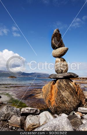 To use this stock image in your creative project, please select the size you need over to the right and click the "Add to Cart" button.
Your downloaded image will come with the Cutcaster watermark removed so don’t worry about the watermark you see on this page. Rock Stack Sculpture stock photo, A rock stacking sculpture statue on a Norwegian landscape by Tyler Olson