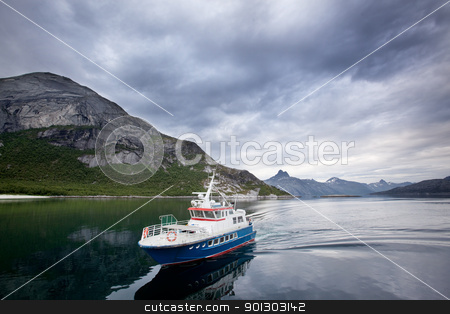 To use this stock image in your creative project, please select the size you need over to the right and click the "Add to Cart" button.
Your downloaded image will come with the Cutcaster watermark removed so don’t worry about the watermark you see on this page. Ferry stock photo, A small ferry in northern Norway on the ocean by Tyler Olson