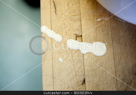 To use this stock image in your creative project, please select the size you need over to the right and click the "Add to Cart" button.
Your downloaded image will come with the Cutcaster watermark removed so don’t worry about the watermark you see on this page. Kitchen Spill stock photo, A cooking detail, a mess on the counter by Tyler Olson