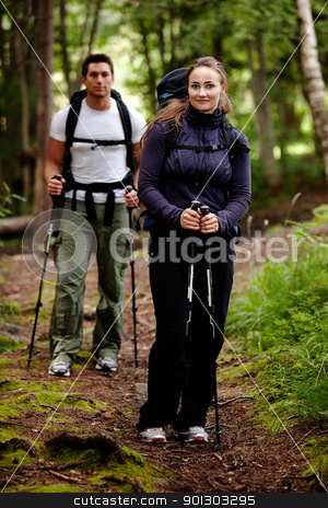 To use this stock image in your creative project, please select the size you need over to the right and click the "Add to Cart" button.
Your downloaded image will come with the Cutcaster watermark removed so don’t worry about the watermark you see on this page. Hike Female stock photo, A pretty female on a camping trip with a male in the background by Tyler Olson