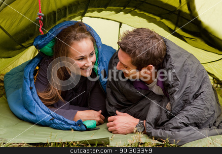 To use this stock image in your creative project, please select the size you need over to the right and click the "Add to Cart" button.
Your downloaded image will come with the Cutcaster watermark removed so don’t worry about the watermark you see on this page. Camping stock photo, A happy couple in a tent looking at each other by Tyler Olson