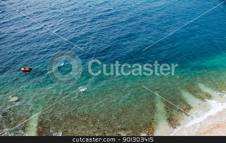 To use this stock image in your creative project, please select the size you need over to the right and click the "Add to Cart" button.
Your downloaded image will come with the Cutcaster watermark removed so don’t worry about the watermark you see on this page. Ocean Background stock photo, An aerial view of a beach and ocean - background texture by Tyler Olson