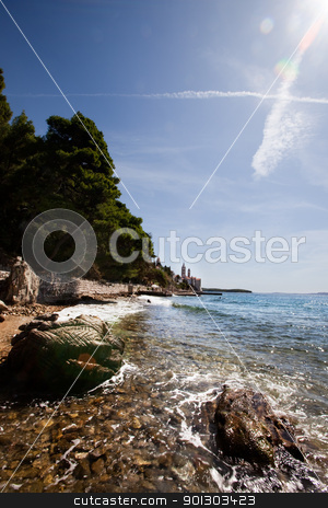 To use this stock image in your creative project, please select the size you need over to the right and click the "Add to Cart" button.
Your downloaded image will come with the Cutcaster watermark removed so don’t worry about the watermark you see on this page. Coast Rab Croatia stock photo, The coast of croatia on the Island of Rab with the old city in the background by Tyler Olson
