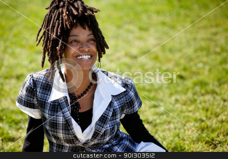 To use this stock image in your creative project, please select the size you need over to the right and click the "Add to Cart" button.
Your downloaded image will come with the Cutcaster watermark removed so don’t worry about the watermark you see on this page. African American Woman stock photo, An attractive African American woman with a candid smile by Tyler Olson