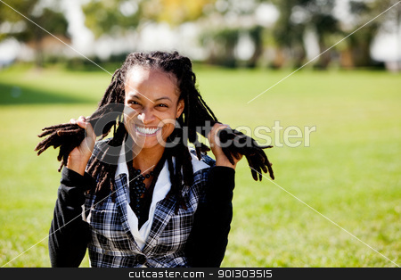 To use this stock image in your creative project, please select the size you need over to the right and click the "Add to Cart" button.
Your downloaded image will come with the Cutcaster watermark removed so don’t worry about the watermark you see on this page. Relax Fun Student stock photo, A young African American woman having fun - isolated on green by Tyler Olson