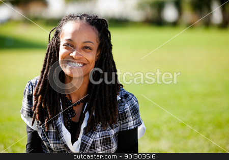 To use this stock image in your creative project, please select the size you need over to the right and click the "Add to Cart" button.
Your downloaded image will come with the Cutcaster watermark removed so don’t worry about the watermark you see on this page. Beautiful Smile Woman stock photo, A beautiful African American with candid smile by Tyler Olson