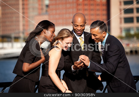 To use this stock image in your creative project, please select the size you need over to the right and click the "Add to Cart" button.
Your downloaded image will come with the Cutcaster watermark removed so don’t worry about the watermark you see on this page. Cell Phone Business stock photo, A group of business people crowded around a cell phone by Tyler Olson