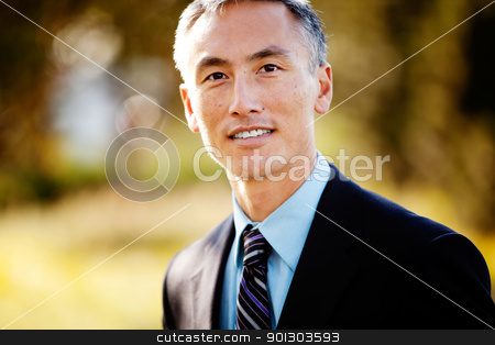 To use this stock image in your creative project, please select the size you need over to the right and click the "Add to Cart" button.
Your downloaded image will come with the Cutcaster watermark removed so don’t worry about the watermark you see on this page. Business Portrait stock photo, A portrait of a friendly Asian looking business man by Tyler Olson