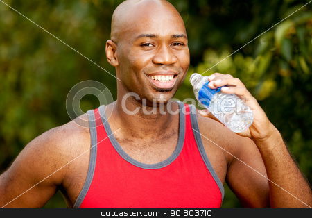 To use this stock image in your creative project, please select the size you need over to the right and click the "Add to Cart" button.
Your downloaded image will come with the Cutcaster watermark removed so don’t worry about the watermark you see on this page. Fitness Water Bottle stock photo, A man exercising in the park, taking a break by Tyler Olson