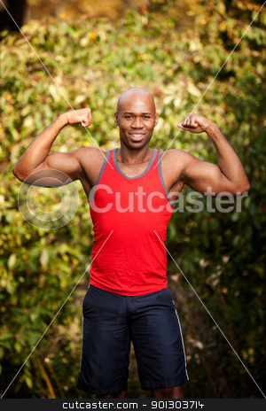 To use this stock image in your creative project, please select the size you need over to the right and click the "Add to Cart" button.
Your downloaded image will come with the Cutcaster watermark removed so don’t worry about the watermark you see on this page. Muscle Fitness stock photo, A male flexing his biceps - isolated against a green by Tyler Olson