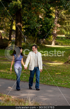 To use this stock image in your creative project, please select the size you need over to the right and click the "Add to Cart" button.
Your downloaded image will come with the Cutcaster watermark removed so don’t worry about the watermark you see on this page. Couple Walk Park stock photo, A couple happy and walking in a park by Tyler Olson