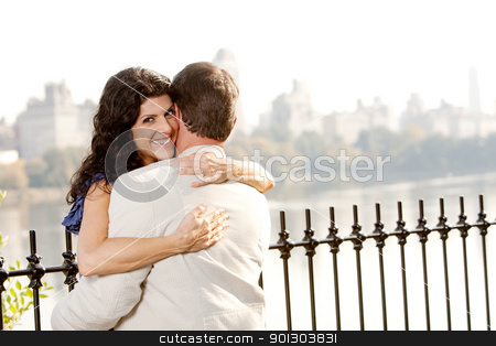 To use this stock image in your creative project, please select the size you need over to the right and click the "Add to Cart" button.
Your downloaded image will come with the Cutcaster watermark removed so don’t worry about the watermark you see on this page. Hug Smile Woman stock photo, A woman hugging a man and looking at the camera with a smile by Tyler Olson