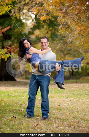 To use this stock image in your creative project, please select the size you need over to the right and click the "Add to Cart" button.
Your downloaded image will come with the Cutcaster watermark removed so don’t worry about the watermark you see on this page. Healthy Relationship Couple stock photo, A happy healthy couple in the park - Man holding the Woman by Tyler Olson