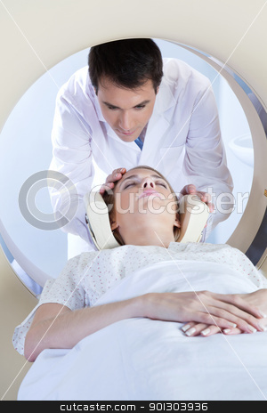 To use this stock image in your creative project, please select the size you need over to the right and click the "Add to Cart" button.
Your downloaded image will come with the Cutcaster watermark removed so don’t worry about the watermark you see on this page. Woman going through MRI scan stock photo, Doctor preparing the patient for MRI scan test by Tyler Olson