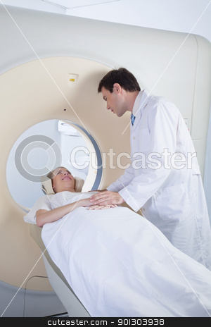 To use this stock image in your creative project, please select the size you need over to the right and click the "Add to Cart" button.
Your downloaded image will come with the Cutcaster watermark removed so don’t worry about the watermark you see on this page. Woman receiving CT scan test stock photo, Doctor comforting patient before CT scan by Tyler Olson