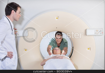 To use this stock image in your creative project, please select the size you need over to the right and click the "Add to Cart" button.
Your downloaded image will come with the Cutcaster watermark removed so don’t worry about the watermark you see on this page. Male nurse preparing patient for CT test stock photo, Male nurse preparing patient for CT scan by Tyler Olson