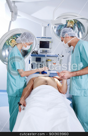 To use this stock image in your creative project, please select the size you need over to the right and click the "Add to Cart" button.
Your downloaded image will come with the Cutcaster watermark removed so don’t worry about the watermark you see on this page. Patient being operated by the surgeons stock photo, Patient being operated by the surgeons in operation theatre by Tyler Olson