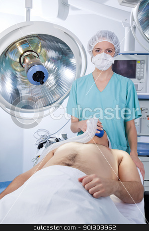 To use this stock image in your creative project, please select the size you need over to the right and click the "Add to Cart" button.
Your downloaded image will come with the Cutcaster watermark removed so don’t worry about the watermark you see on this page. Doctor applying gas mask to a patient stock photo, Female doctor applying gas mask to a patient in the hospital by Tyler Olson