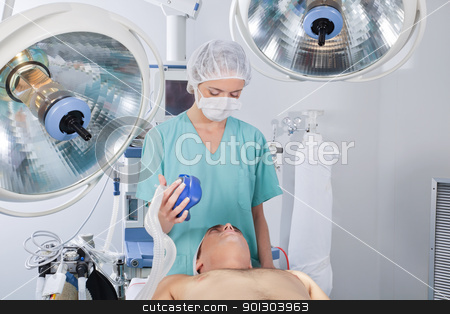 To use this stock image in your creative project, please select the size you need over to the right and click the "Add to Cart" button.
Your downloaded image will come with the Cutcaster watermark removed so don’t worry about the watermark you see on this page. Doctor applying oxygen mask stock photo, Doctor applying oxygen mask on patient before operation by Tyler Olson