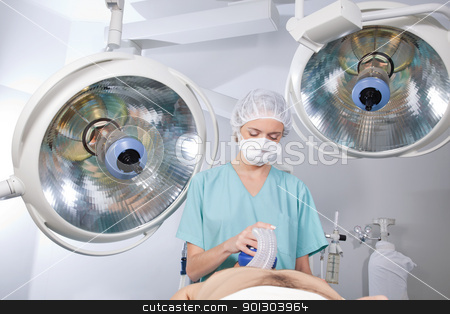 To use this stock image in your creative project, please select the size you need over to the right and click the "Add to Cart" button.
Your downloaded image will come with the Cutcaster watermark removed so don’t worry about the watermark you see on this page. Anesthetist in Operation Room stock photo, Anesthetist watching over patient before surgery by Tyler Olson