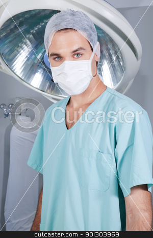 To use this stock image in your creative project, please select the size you need over to the right and click the "Add to Cart" button.
Your downloaded image will come with the Cutcaster watermark removed so don’t worry about the watermark you see on this page. Confident doctor looking at camera stock photo, Portrait of a surgeon in the operating theatre by Tyler Olson