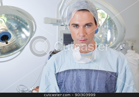 To use this stock image in your creative project, please select the size you need over to the right and click the "Add to Cart" button.
Your downloaded image will come with the Cutcaster watermark removed so don’t worry about the watermark you see on this page. Close-up of male surgeon stock photo, Close-up portrait of smart confident young male surgeon by Tyler Olson