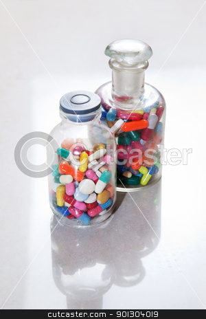 To use this stock image in your creative project, please select the size you need over to the right and click the "Add to Cart" button.
Your downloaded image will come with the Cutcaster watermark removed so don’t worry about the watermark you see on this page. Medical drugs in a bottle stock photo, Bottle of tablets, capsules and medical drug by Tyler Olson