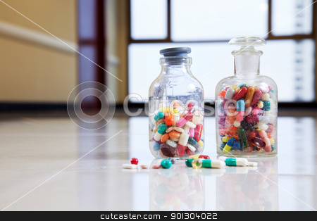 To use this stock image in your creative project, please select the size you need over to the right and click the "Add to Cart" button.
Your downloaded image will come with the Cutcaster watermark removed so don’t worry about the watermark you see on this page. Medical capsules and tablets in a bottle stock photo, Bottle of tablets, capsules and medical drug by Tyler Olson