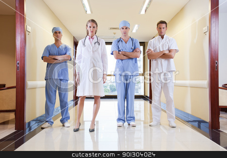 To use this stock image in your creative project, please select the size you need over to the right and click the "Add to Cart" button.
Your downloaded image will come with the Cutcaster watermark removed so don’t worry about the watermark you see on this page. Team of doctor and nurse standing stock photo, Team of doctor and nurse standing in hallway of hospital by Tyler Olson
