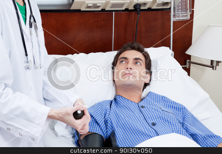 To use this stock image in your creative project, please select the size you need over to the right and click the "Add to Cart" button.
Your downloaded image will come with the Cutcaster watermark removed so don’t worry about the watermark you see on this page. Doctor checking patient's blood pressure stock photo, Female doctor checking patient's blood pressure in the hospital by Tyler Olson