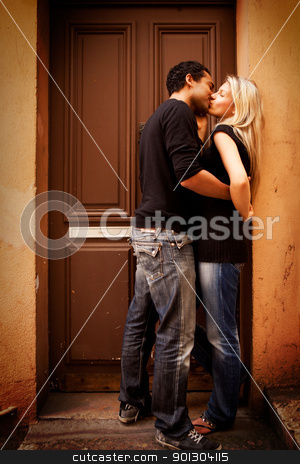 To use this stock image in your creative project, please select the size you need over to the right and click the "Add to Cart" button.
Your downloaded image will come with the Cutcaster watermark removed so don’t worry about the watermark you see on this page. Kiss Europe Street stock photo, A couple kissing in an urban European setting by Tyler Olson