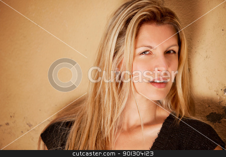 To use this stock image in your creative project, please select the size you need over to the right and click the "Add to Cart" button.
Your downloaded image will come with the Cutcaster watermark removed so don’t worry about the watermark you see on this page. Beautiful European Woman stock photo, A casual street portrait of a happy attractive european woman by Tyler Olson