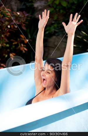 To use this stock image in your creative project, please select the size you need over to the right and click the "Add to Cart" button.
Your downloaded image will come with the Cutcaster watermark removed so don’t worry about the watermark you see on this page. Woman on Waterslide stock photo, A womain on a water slide having fun by Tyler Olson