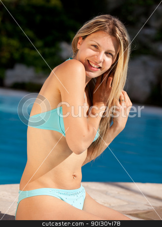 To use this stock image in your creative project, please select the size you need over to the right and click the "Add to Cart" button.
Your downloaded image will come with the Cutcaster watermark removed so don’t worry about the watermark you see on this page. Woman Pool Portrait stock photo, A woman relaxing at a pool in a bikini by Tyler Olson