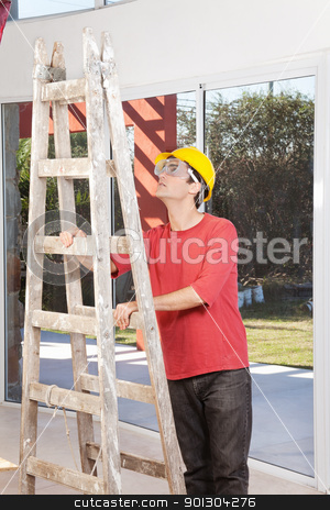 To use this stock image in your creative project, please select the size you need over to the right and click the "Add to Cart" button.
Your downloaded image will come with the Cutcaster watermark removed so don’t worry about the watermark you see on this page. Engineer with ladder stock photo, Engineer wearing helmet and eyegear and holding ladder by Tyler Olson