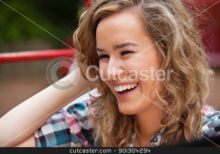 To use this stock image in your creative project, please select the size you need over to the right and click the "Add to Cart" button.
Your downloaded image will come with the Cutcaster watermark removed so don’t worry about the watermark you see on this page. Cheerful young woman laughing stock photo, Young African American woman showing you thumbs up by Tyler Olson