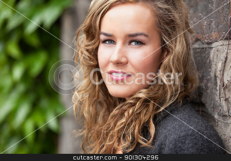 To use this stock image in your creative project, please select the size you need over to the right and click the "Add to Cart" button.
Your downloaded image will come with the Cutcaster watermark removed so don’t worry about the watermark you see on this page. Young female leaning against wall stock photo, Portrait of beautiful young female leaning against stone wall by Tyler Olson