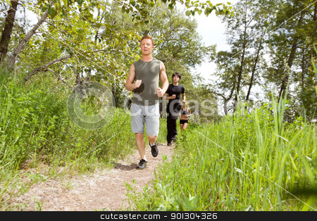 To use this stock image in your creative project, please select the size you need over to the right and click the "Add to Cart" button.
Your downloaded image will come with the Cutcaster watermark removed so don’t worry about the watermark you see on this page. Friends exercising in forest track stock photo, Young friends jogging in the forest on trail by Tyler Olson