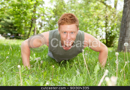 To use this stock image in your creative project, please select the size you need over to the right and click the "Add to Cart" button.
Your downloaded image will come with the Cutcaster watermark removed so don’t worry about the watermark you see on this page. Portrait of man doing a push up stock photo, An attractive Caucasian man doing a push up outdoors by Tyler Olson