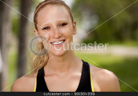 To use this stock image in your creative project, please select the size you need over to the right and click the "Add to Cart" button.
Your downloaded image will come with the Cutcaster watermark removed so don’t worry about the watermark you see on this page. Jogger Portrait stock photo, A portrait of a happy female jogger smiling at the camera by Tyler Olson