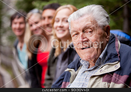 To use this stock image in your creative project, please select the size you need over to the right and click the "Add to Cart" button.
Your downloaded image will come with the Cutcaster watermark removed so don’t worry about the watermark you see on this page. Grandfather Portrait stock photo, A portrait of a grandfather type man with a group of young people by Tyler Olson