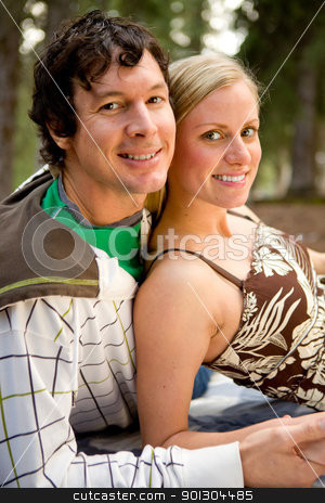 To use this stock image in your creative project, please select the size you need over to the right and click the "Add to Cart" button.
Your downloaded image will come with the Cutcaster watermark removed so don’t worry about the watermark you see on this page. Camping Couple Relax stock photo, An outdoor portrait of a happy couple on a camping trip by Tyler Olson