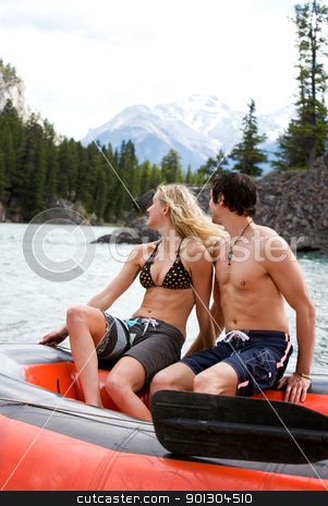 To use this stock image in your creative project, please select the size you need over to the right and click the "Add to Cart" button.
Your downloaded image will come with the Cutcaster watermark removed so don’t worry about the watermark you see on this page. River Rafting stock photo, A happy excited couple on a river raft by Tyler Olson
