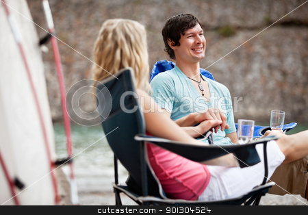 To use this stock image in your creative project, please select the size you need over to the right and click the "Add to Cart" button.
Your downloaded image will come with the Cutcaster watermark removed so don’t worry about the watermark you see on this page. Young couple enjoying the vacation stock photo, Young couple holding hands and enjoying the vacation by Tyler Olson