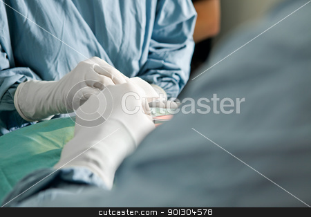 To use this stock image in your creative project, please select the size you need over to the right and click the "Add to Cart" button.
Your downloaded image will come with the Cutcaster watermark removed so don’t worry about the watermark you see on this page. Surgery Detail stock photo, Two people in scrubs with a detail shot of their hands working in a surgery by Tyler Olson