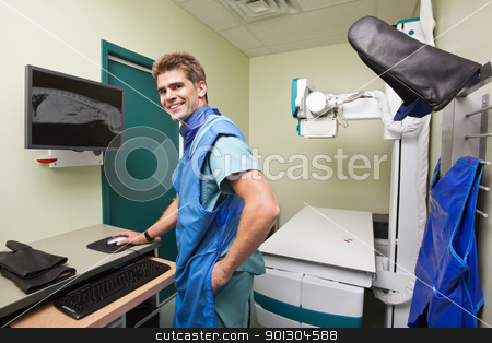 To use this stock image in your creative project, please select the size you need over to the right and click the "Add to Cart" button.
Your downloaded image will come with the Cutcaster watermark removed so don’t worry about the watermark you see on this page. Radiologist examining X-ray of dog's spine stock photo, Radiologist examining dog's x-ray in examination room by Tyler Olson