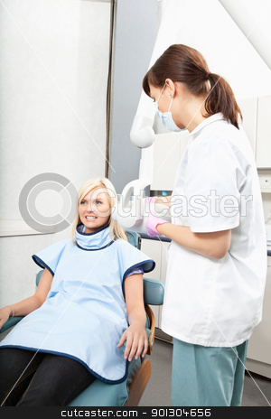 To use this stock image in your creative project, please select the size you need over to the right and click the "Add to Cart" button.
Your downloaded image will come with the Cutcaster watermark removed so don’t worry about the watermark you see on this page. Dentist Xray stock photo, Female dental assistant taking oral x-ray of a patient by Tyler Olson